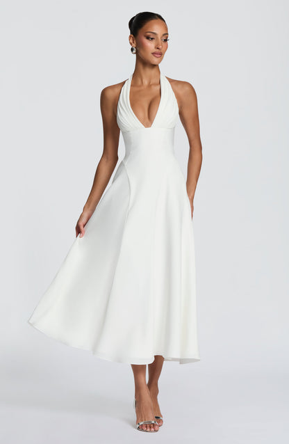 Vestido blanco midi sin mangas con escote halter en V profunda y falda amplia