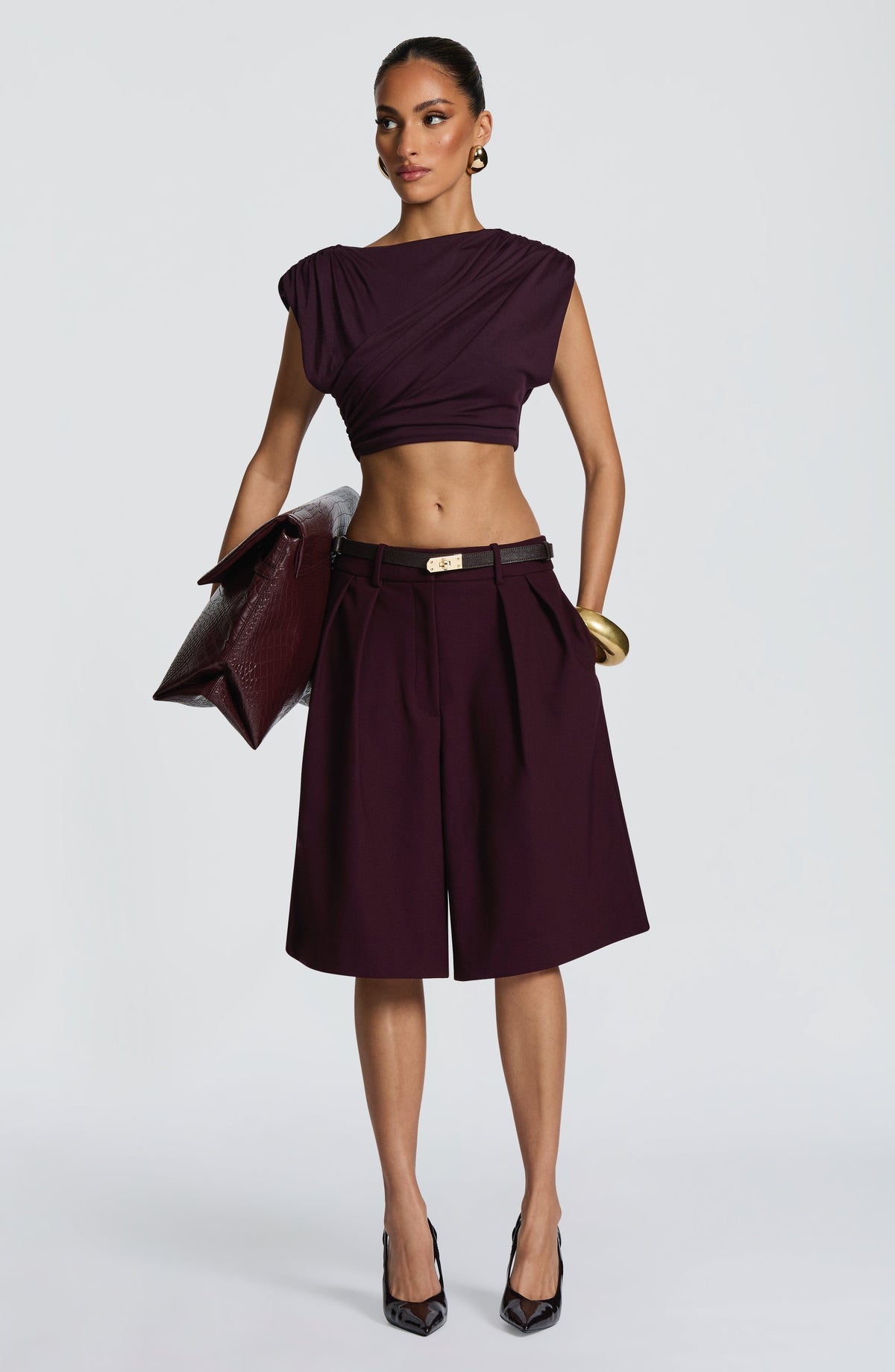 Top Amara ciruela sin mangas con drapeado cruzado y escote tipo halter