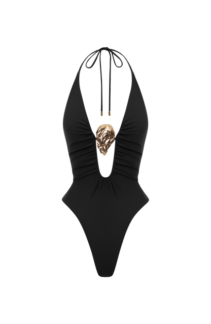 Bañador negro tipo halter con adorno dorado central y espalda con tiras