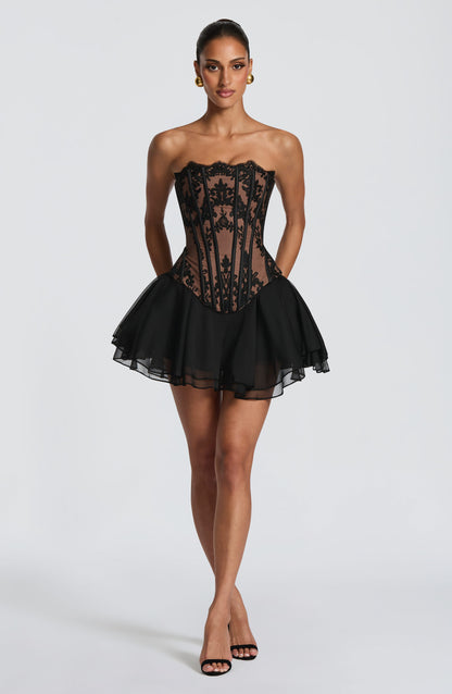 Corsé negro strapless con encaje floral y falda de tul corto