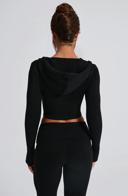 Sudadera negra corta de punto con capucha, vista trasera