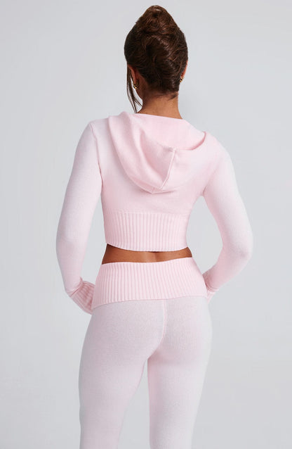 Sudadera rosa con capucha, dobladillo acanalado y cremallera; vista trasera