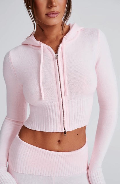 Sudadera rosa de punto acanalado con capucha, cremallera frontal y cordones en la capucha