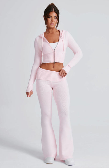 Pantalón rosa acampanado de tiro medio, tejido con relieve; vista frontal