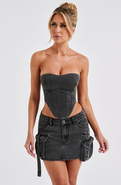 Corsé YASMIN strapless de denim negro con falda corta y tiras decorativas